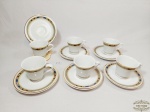 Jogo de 6 Xicaras Café em Porcelana Germer Decorada Flores. Medida: Xicaras 5,5 cm altura x 6,5 cm diametro e pires12,5 cm