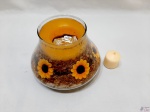 Vaso decorativo em vidro e vela. Medindo o vaso 12,5cm de altura.