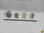 Lote de 4 mini canecas e bandeja retangular em porcelana, modelos e marcas diversas. Medindo 29cm x 9,5cm.