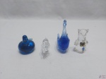 Lote de 4 enfeites, composto de 3 aves e 1 cachorro, peças em vidro e cristal. Medindo o cisne 10cm de altura.