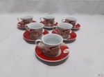 Jogo de 6 xícaras de café em porcelana com motivos natalinos. Com leves desgastes.