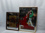Lote composto de 2 quadros decorativos espelhados. Medindo o maior 61cm x 40,5cm.