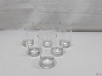 Jogo de 6 copos longos em demi-cristal incolor. Medindo 14cm de altura x 7,5cm de diâmetro de boca.