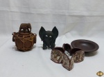 Lote diverso, composto de porta guardanapo em ferro, petisqueira redonda em porcelana, etc. Medindo a petisqueira redonda 14cm de diâmetro.