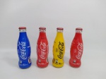 Lote de 4 garrafas Coca-Cola, vazias, comemorativas, no estado