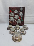 Jogo de 6 xícaras de café em porcelana com suporte e pires em prata 90 Wolff.