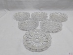 Jogo de 6 petisqueira redondas em cristal ricamente lapidado. Medindo 15cm de diâmetro.