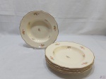 Jogo de 6 pratos fundos em porcelana inglesa, floral com friso ouro. Medindo 23cm de diâmetro.
