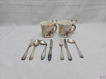 Kit infantil composto de 2 canecas em porcelana e 7 talheres em prata 90.