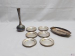 Lote diverso, composto de 6 descansos de copo, 1 vaso floreira solifleur e 1 petisqueira oval em prata 90.