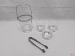 Lote diverso, composto de balde de gelo em cristal, 3 copos de whisky em cristal e pinça em prata 90. Medindo o balde 13cm de altura x 11cm de diâmetro.