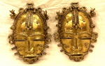 Arte Africana.                                                                                                                                                                 Par de Mascaras em Bronze. (Baule,  Costa do Marfim)                                                                           Med. Alt. 19 cm.  Larg. 13,5 cm.