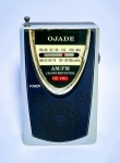 Antigo Rádio de Bolso AM-FM OJADE - Funcionando perfeitamente com duas pilhas pequenas - Possui entrada para fone de ouvidos - Medida: 10 x 6,5 cm.