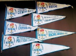 Lote de 7 Antigas e Raras Flâmula da Universidade do Estado da Guanabara - Sendo: Faculdade de Ciências Médicas, Instituto de Criminologia, Escola de Enfermagem Rachel Haddock Lôbo, Instituto de Higiene, Instituto de Estudos Econômicos, Políticos e Sociais, Colégio de Aplicação Prof. Fernando Rodrigues da Silveira, e 1 flâmula em branco, com o símbolo da UEG. Medida de cada: 43 Cm de comprimento. OBS: 3 Flâmulas possuem pequenas perdas por conta do tempo. Conforme fotos.