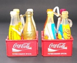 2 Engradados Coca-Cola Olimpíadas Atenas 2004 - Com 8 diferentes garrafinhas - Conforme fotos - Medida de cada engradado: 5,5 x 5,5 x 3 cm.