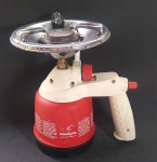 fogareiro portátil IDEALGAS muito utilizado em camping  - Made in Italy - Acendimento elétrico funcionando ''centelhando''  - Necessita de gás ''refil'' - Estrutura em plástico rígido em metal - Medida: 21 x 20 x 14 cm de diâmetro.