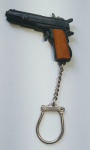 Raro Chaveiro Miniatura Formato de Pistola - Marca Victory - Espoleta - funcionando - Importado - Medida: 6 cm de comprimento.