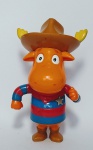 Backyardigans - Boneco Sonoro Tyrone com trajes de Cowboy - Mattel 2005 - Emite som ao apertar a estrela - Funciona com 2 pilhas AA (Não acompanha pilha) - Medida: 21 cm de comprimento.