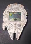 Mini Game da nave Millennium Falcon do filme Star Wars  - fabricante : Candide Corporation  - Em perfeito estado de funcionamento  -  Medida: 10 X 14 cm.