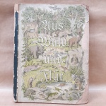 Álbum - Alemão de 1938 com matéria escrita e fotos coladas de animais em seu habitat natural, pequenas marcas do tempo e de uso.