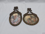 Par de moldura para camafeu em metal ricamente trabalhado com relevos. Medindo o maior 29cm x 15cm.