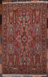 Tapete confeccionado à mão oriental decorado por motivos florais e franjas Multicolorido. Excelente qualidade. Medida: 150 cm x 106 cm