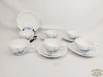 Jogo de 6 Xicaras de Chá e 5 pires em  fina Porcelana  possivelmen te europeia floral Azul e Branca. Medida: Xicara 5,5 cm x 9 cm e pires 15 cm