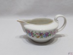 Leiteira, cremeira em porcelana vista alegre barra floral com friso ouro. Medindo 8cm de altura x 15,5cm bico alça.