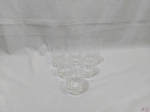 Jogo de 6 copos longos em cristal lapidado com base pesada. Medindo 7,5cm de diâmetro de boca x 14cm de altura.