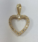 PINGENTE CORAÇÃO CONFECCIONADO EM OURO AMARELO 18K, COM 22 DIAMANTES 1,2 PONTOS CADA 0,38Ct, PESO: 2,3g, TAMANHO: 16mm, VALOR DE MERCADO: RS 3.600,00