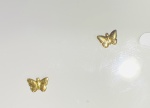BRINCO BORBOLETA CONFECCIONADA EM OURO 18K, PESO: 0,5g, TAMANHO: 5,6X4mm. VALOR DE MERCADO: R$ 500,00