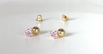 Brinco  Baby, confeccionado em ouro amarelo 18k, com zirconia rosa, Peso: 0,4g, tamanho do brinco 5mm, Possui tarraxas fechadas, especiais para bebês.