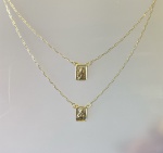 ESCAPULÁRIO UMA FACE CONFECCIONADO EM OURO AMARELO 18K, PESO: 1,7g, TAMANHO: 60cm, VALOR DE MERCADO: R$ 1.000,00