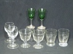 Quatro pares de taças em vidro translúcido, sendo 1 dos pares na cor verde. Total de 8 taças. Alt da maior. 9cm.
