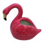 Exótico regador em porcelana com forma de flamingo. Medida 23x19,5cm.