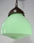 Luminária de teto em vidro opalinado leitoso em tom verde Art Déco, com pendente em bronze. Alt: 60 cm.