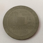 COLECIONISMO - CASSINO (03) - MOEDA DE UM DOLAR ONE DOLLAR GAMING TOKEN THE MGM GRAND LAS VEGAS, datada de 1979). Em metal, mede aprox. 3,7 cm de diâmetro.