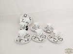 Jogo de 6 Xicaras de Café em Porcelana Decorada Branca e preto. Medida: 6,5 cm x 6 e pires 12 cm
