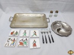 Lote composto de bandeja retangular em prata 90, saleiro e pimenteiro, petisqueira 3 divisões em aço inox Eberle, 4 garfos de aperitivo e 6 descansos de copo. Medindo a bandeja 43cm alça alça x 23cm de largura.