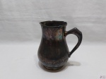 Jarra para água, sucos em prata 90 Fracalanza, modelo lacinho. Medindo 19cm de altura. Necessita de limpeza.