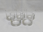 Jogo de 5 copos de whisky em vidro com base pesada. Medindo 8,5cm de diâmetro x 8,5cm de altura.