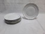 Jogo de 5 pratos de sobremesa em porcelana branca com relevo na borda. Medindo 19,5cm de diâmetro.