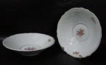 PORCELANA SCHMIDT - Lote contendo duas tigelas em porcelana vitrificada branca, decoradas com motivos vegetalistas e filetes dourados, bordas movimentadas, marcadas no fundo. Medidas da maior alt 6 cm x diam 24,5 cm; medidas da menor alt 6 cm x diam 22,5 cm.