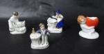 PORCELANA - Lote com quatro esculturas em miniaturas, confeccionadas em porcelana vitrificada branca, contendo três floreiras, sendo uma da manufatura Vieira de Castro Rio (marcada no fundo), e um paliteiro. Medidas da maior alt 8 cm x comp 5 cm x larg 3,5 cm; medidas da menor alt 6,5 cm x comp 4,5 cm x larg 2,5 cm.