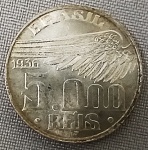 NUMISMÁTICA,NUMISMÁTICA, Brasil, República, uma (1) moeda de 5000 reis em prata de 1936, com a efígie do Pai da Aviação Santos Dumont, excelente estado de conservação, popularmente conhecida à época por voando para o mangue, trocadilho em alusão da asa no anverso da moeda e o preço de um programa na zona no Rio Antigo que ficava próximo ao Canal do Mangue, peso total aproximado 10gr.