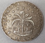 NUMISMÁTICA, Bolívia, uma (1) moeda em PRATA (903 milésimos) de 1 peso 1863 FP (iniciais dos abridores do cunho Fortunato Equivar / ?), cunhada em POTOSI (representada pelo monograma com as letras PTS), muito bom estado de conservação, bordo serrilhado e legendado Ayacuceo Sucre 1824, medindo aproximadamente 35 mm, peso 20 gr.