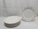 Jogo de 6 pratos rasos em porcelana branca com flores na borda. Medindo 26cm de diâmetro.