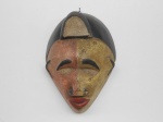 Mascara Afro, em madeira antiga.