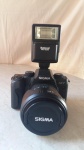 Camera antiga Sigma com lente, otimo estado.