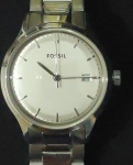 Relógio da Fóssil com caixa e pulseira de aço, vidro safira, funcionando, fundo champanhe. 5atm, numeração ES 3160 - 861209 - Diâmetro da caixa 35mm.